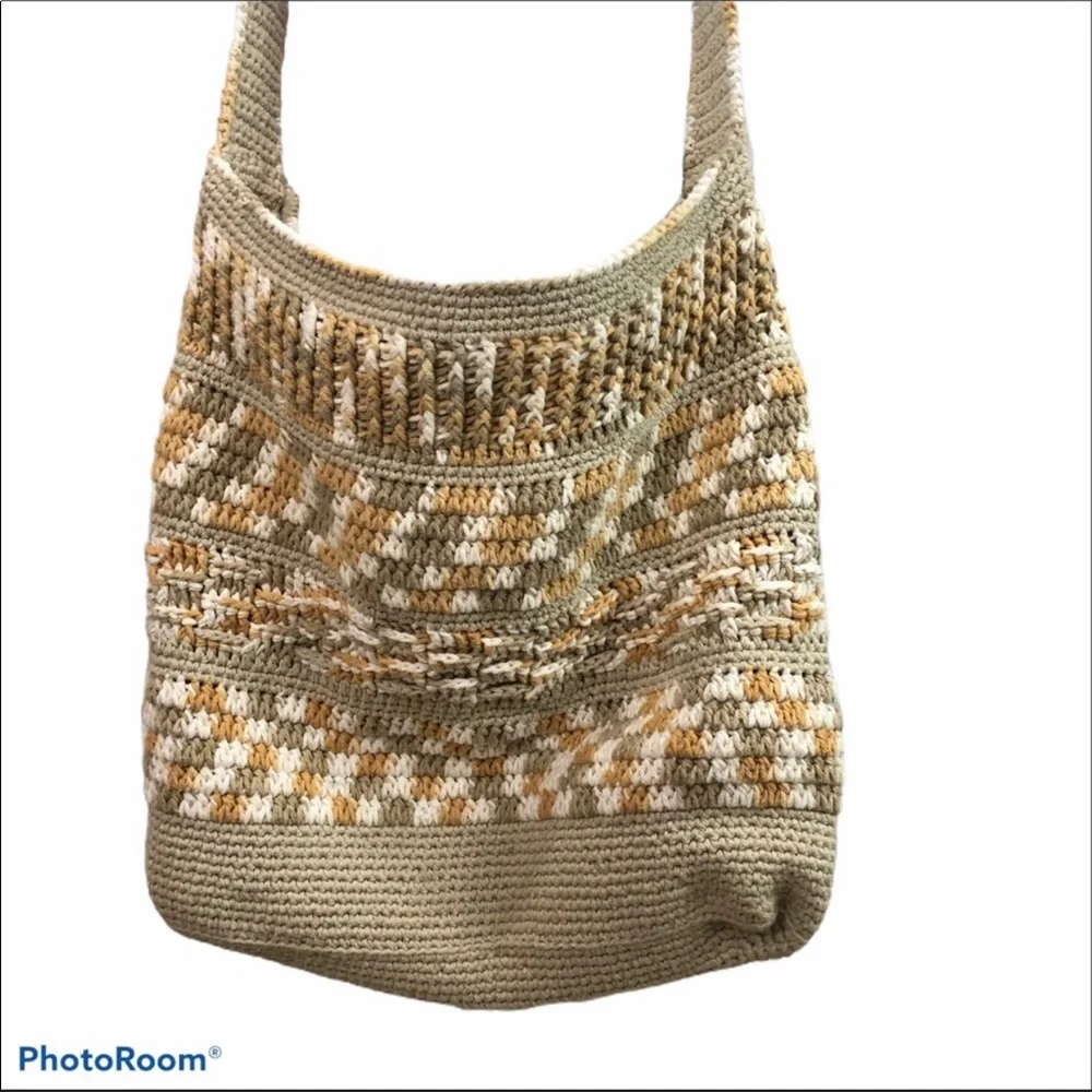 Large tan and cream crocheted crossbody bag with zipper top